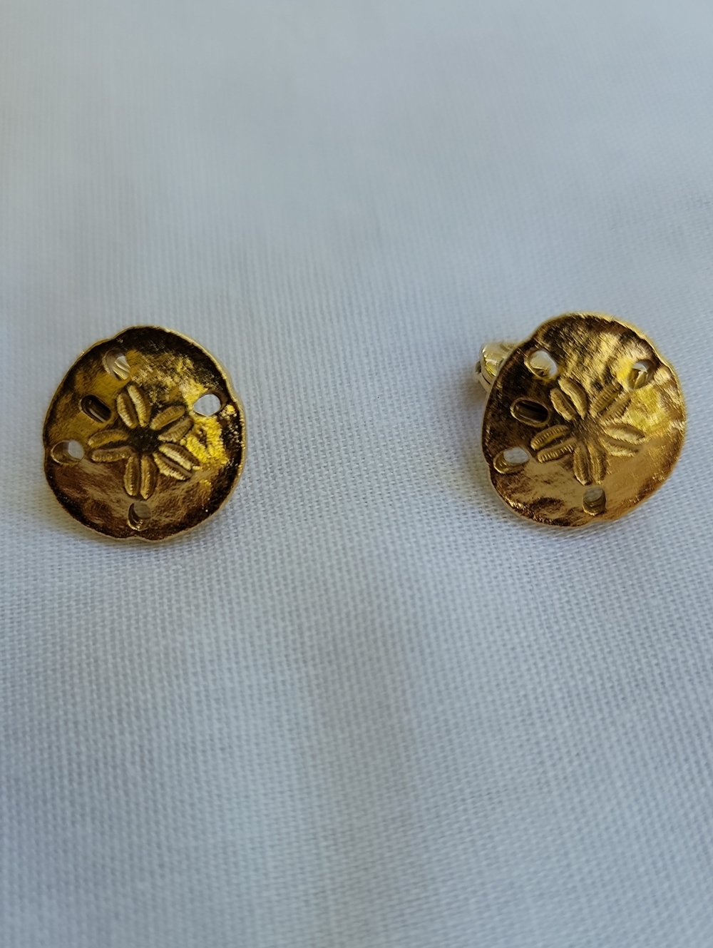 Vintage Monet Gold Tone Sand Dollar Clip Earrings - Classic Beach-Inspired Style